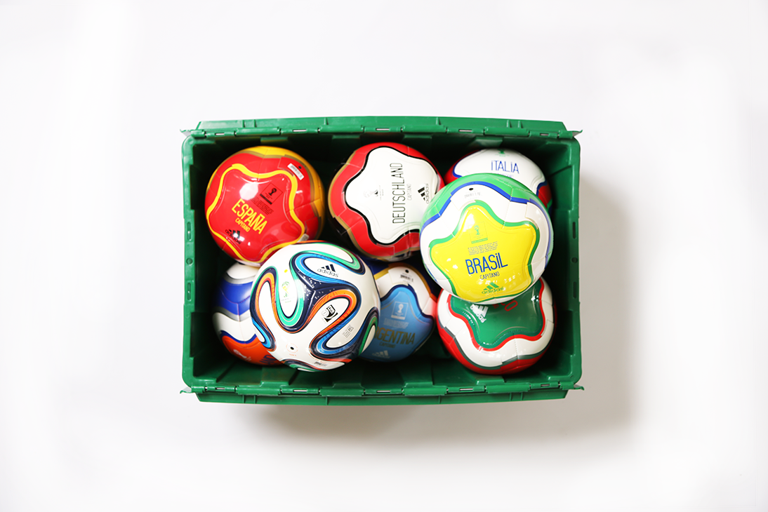 A MakeSpace storage bin full of 2014 FIFA World Cup soccer balls from the Adidas store in SoHo Manhattan