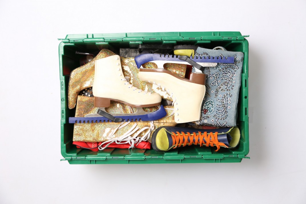 The green MakeSpace storage bin of Emmy-award winning food and travel journalist Michael-Ann Rowe stores her ice skates, jackets, and snow boots.