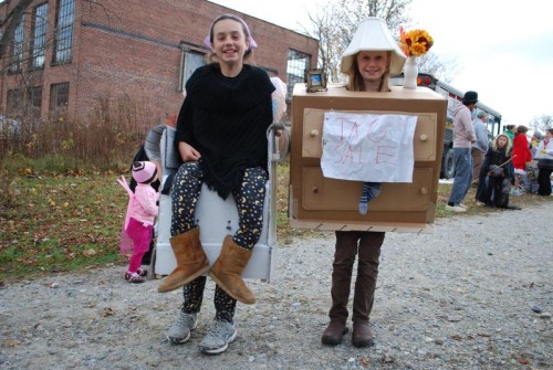 A garage sale storage dresser and chair homemade Halloween costume.