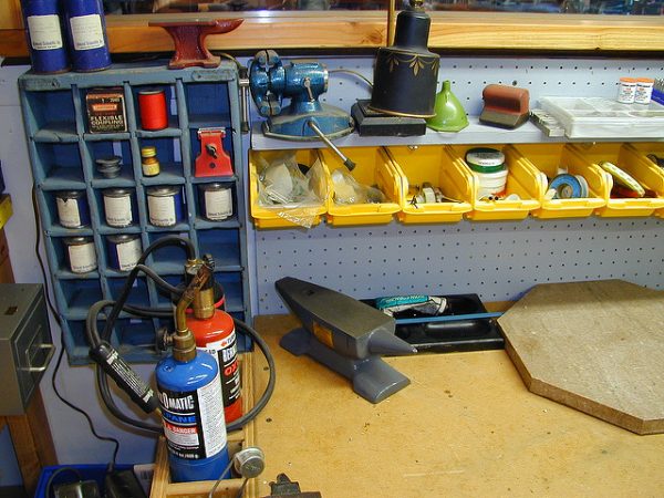 garage wall-mounted pegboard storage bins