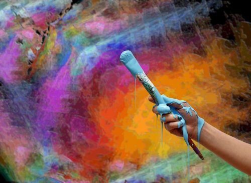 brightly painted wall with paintbrush