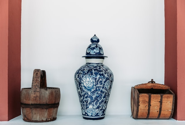 a blue and teal vase