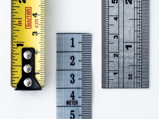 a scale, and two tape measurements