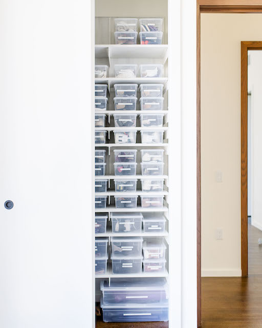 Bins of clothes organized neatly
