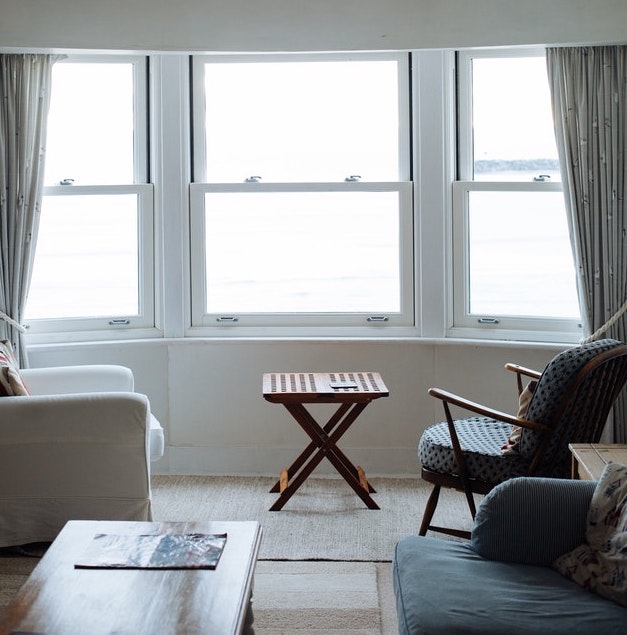 Three clean, bright windows in a living room